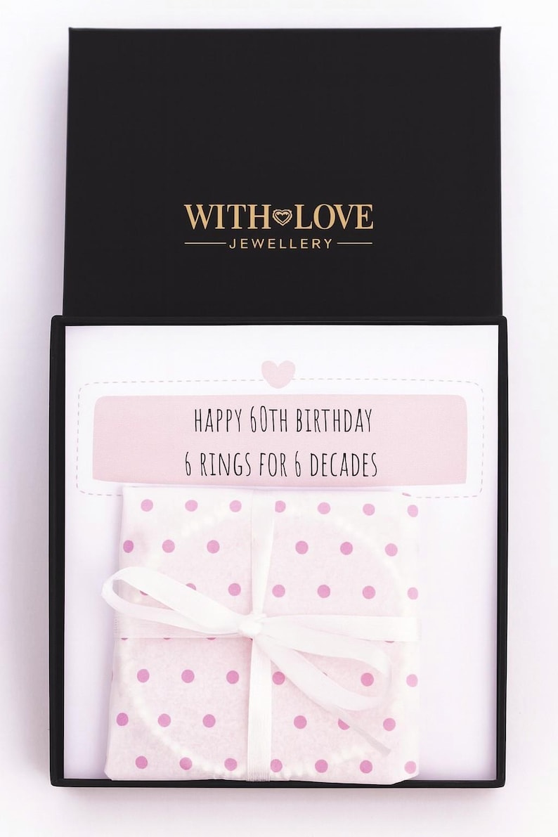 Jewelry set with polka dot design in a 'With Love Jewellery' box on a white background