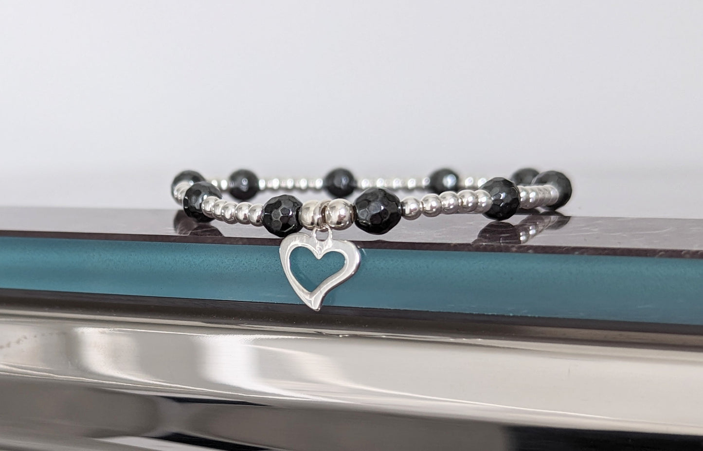 Sterling Silver and Hematite Heart Bracelet With Love Jewellery UK