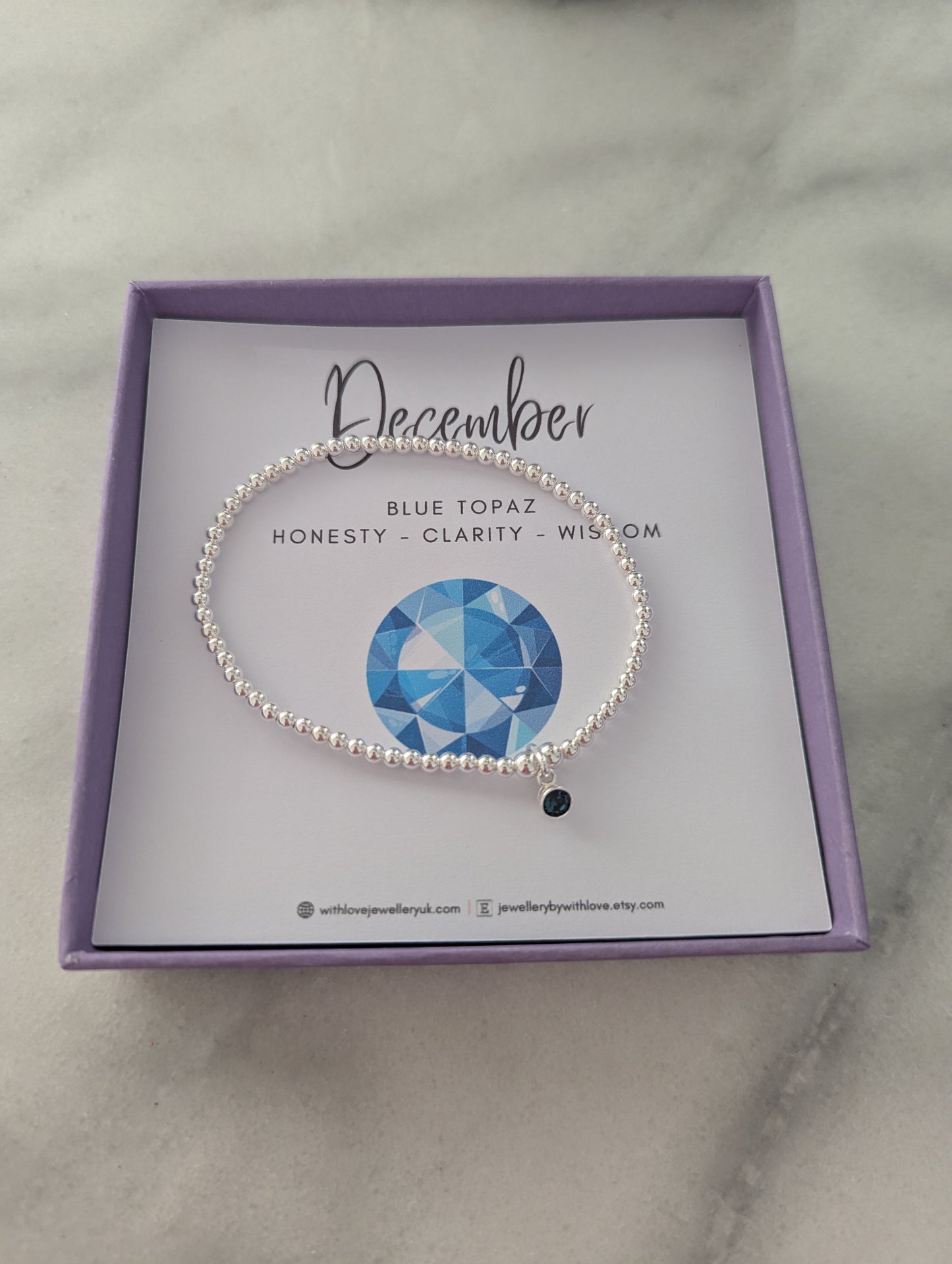 Sterling Silver December Birthday Bracelet (Blue Topaz)