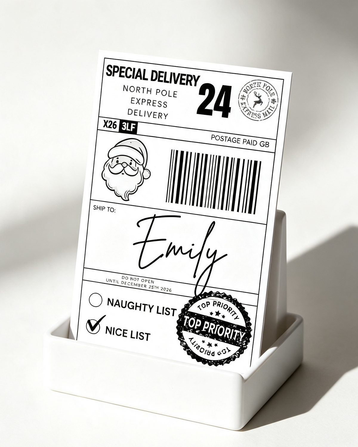 Christmas postage label on a wrapped present, self adhesive 4 x 6 inch Santa gift label. Personalised gift wrapping.