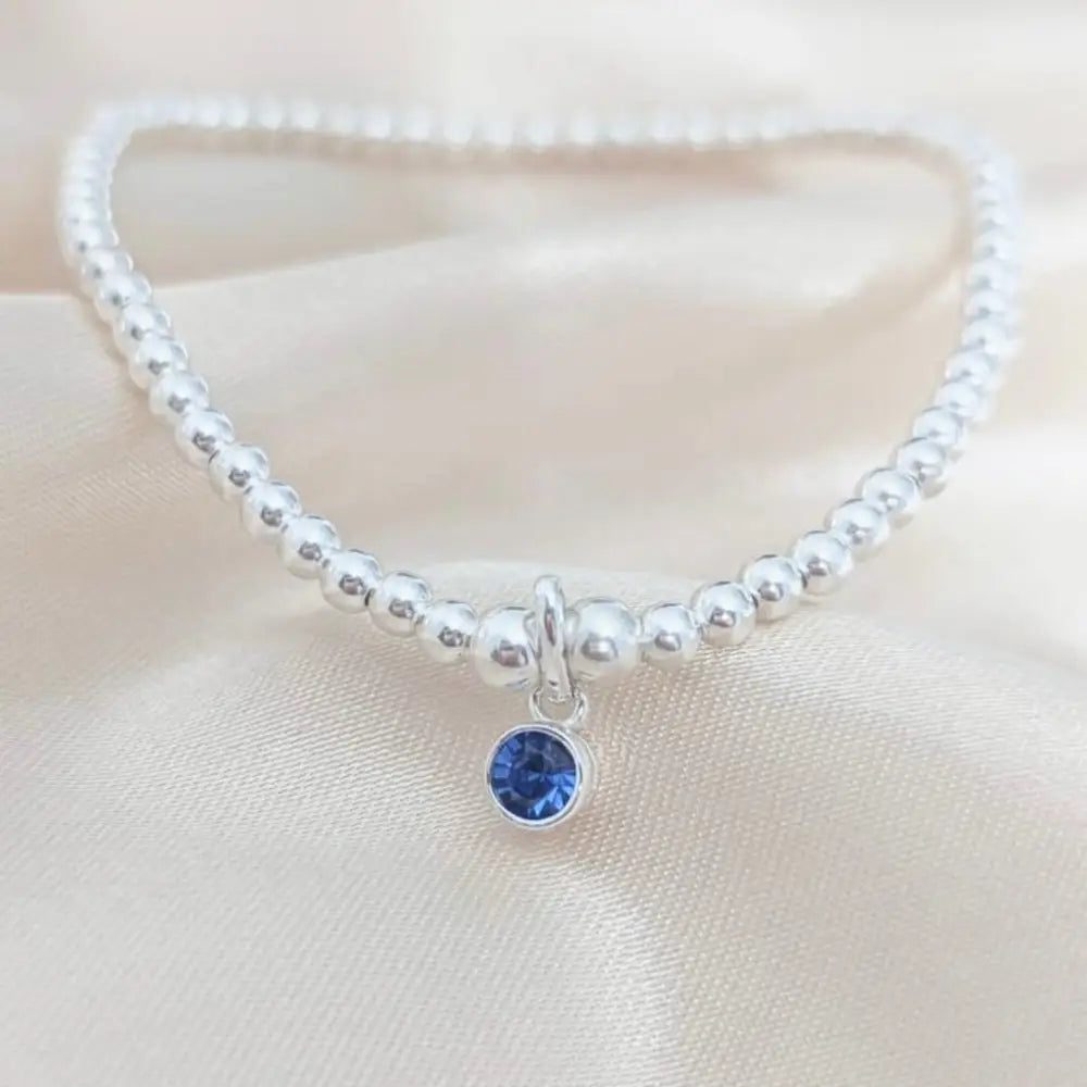 Sterling Silver September Birthstone Bracelet/Earrings (Sapphire) Bracelets