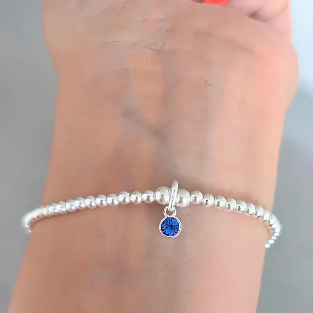 Sterling Silver September Birthstone Bracelet/Earrings (Sapphire) Bracelets