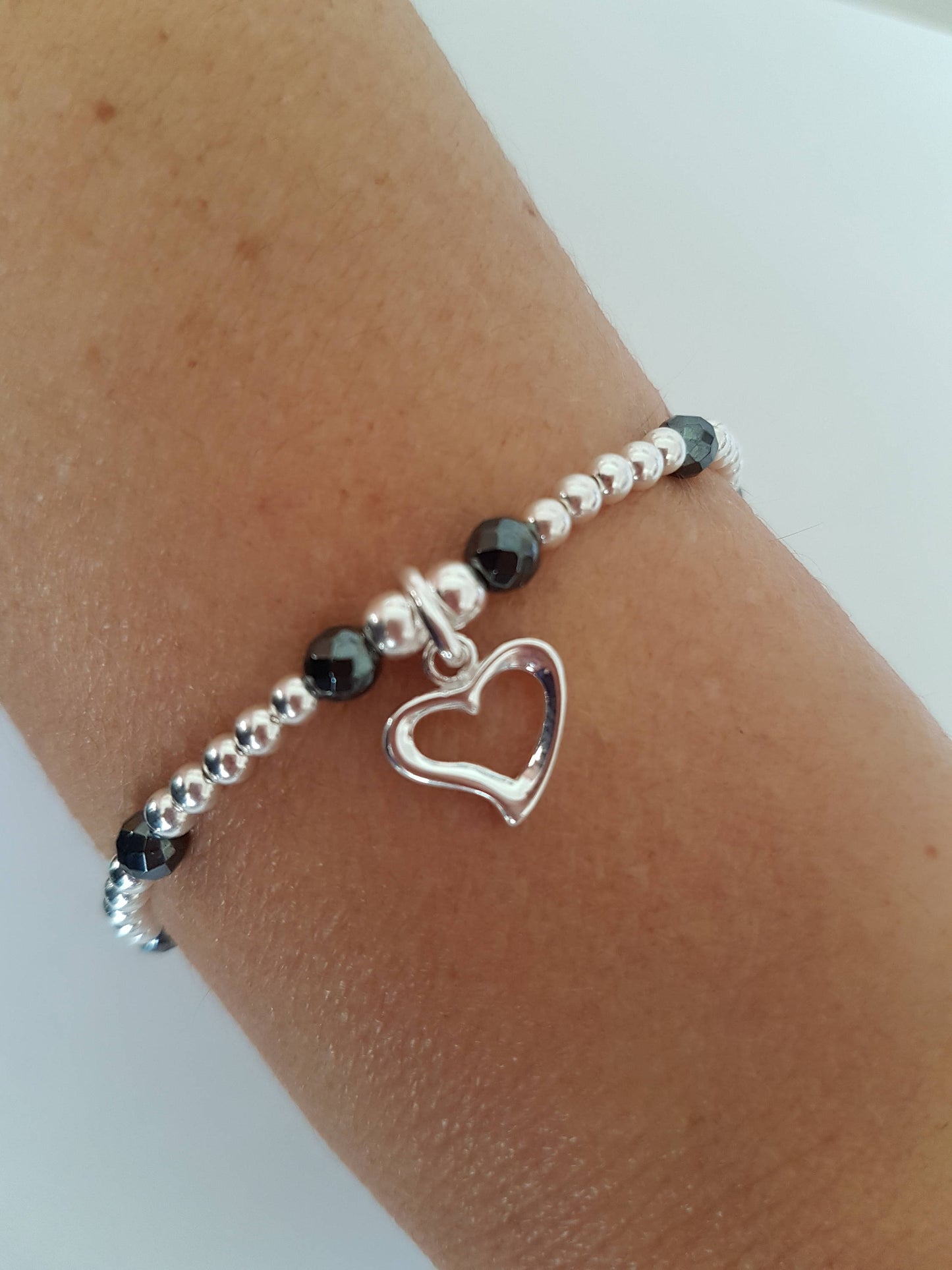 Sterling Silver and Hematite Heart Bracelet With Love Jewellery UK